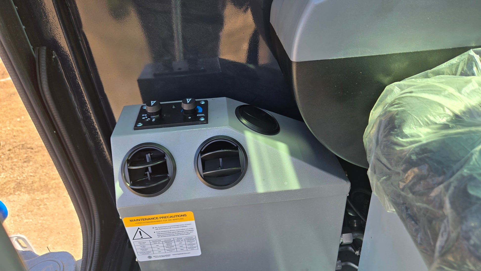 JT5350 3.5 ton mini excavator cab interior showing air conditioning control and ventilation system Canada compact excavator with Kubota engine for operator comfort