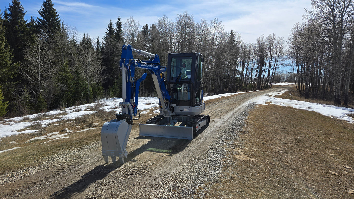 JT5350 3.5 ton mini excavator with Kubota engine operating on gravel road Canada compact excavator for roadwork earthmoving and construction use