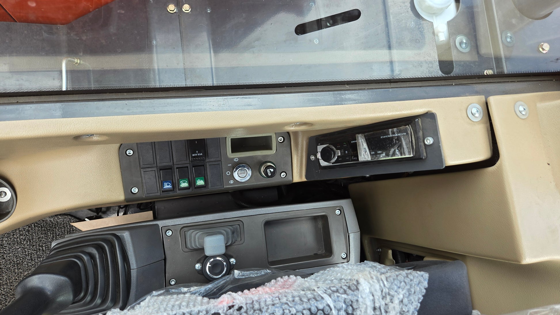Dashboard control panel and joystick of JT5600 6 ton mini excavator with Yanmar engine for sale in Canada, modern compact excavator interior design