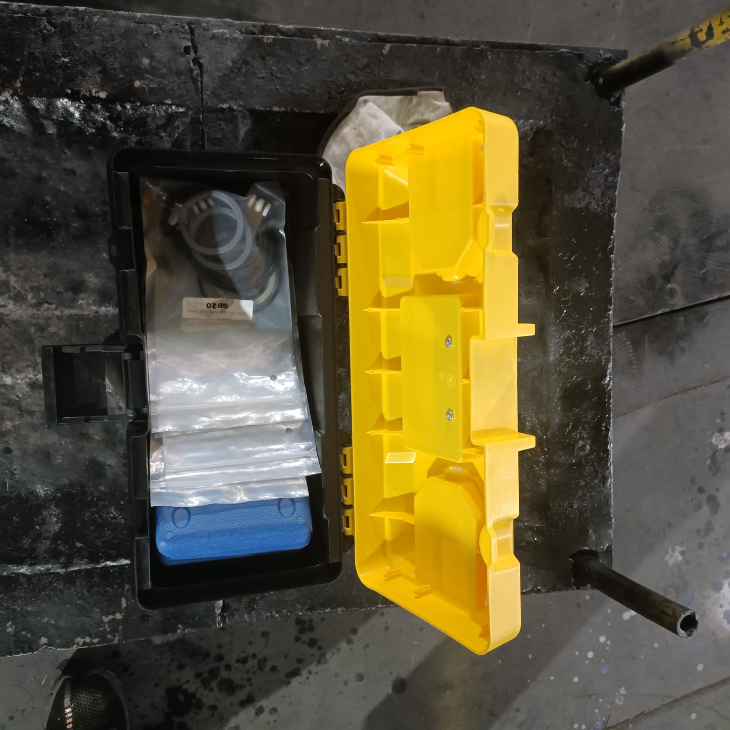 Tool box kit for custom excavator attachments made in Canada containing hydraulic fittings and maintenance parts for construction equipment