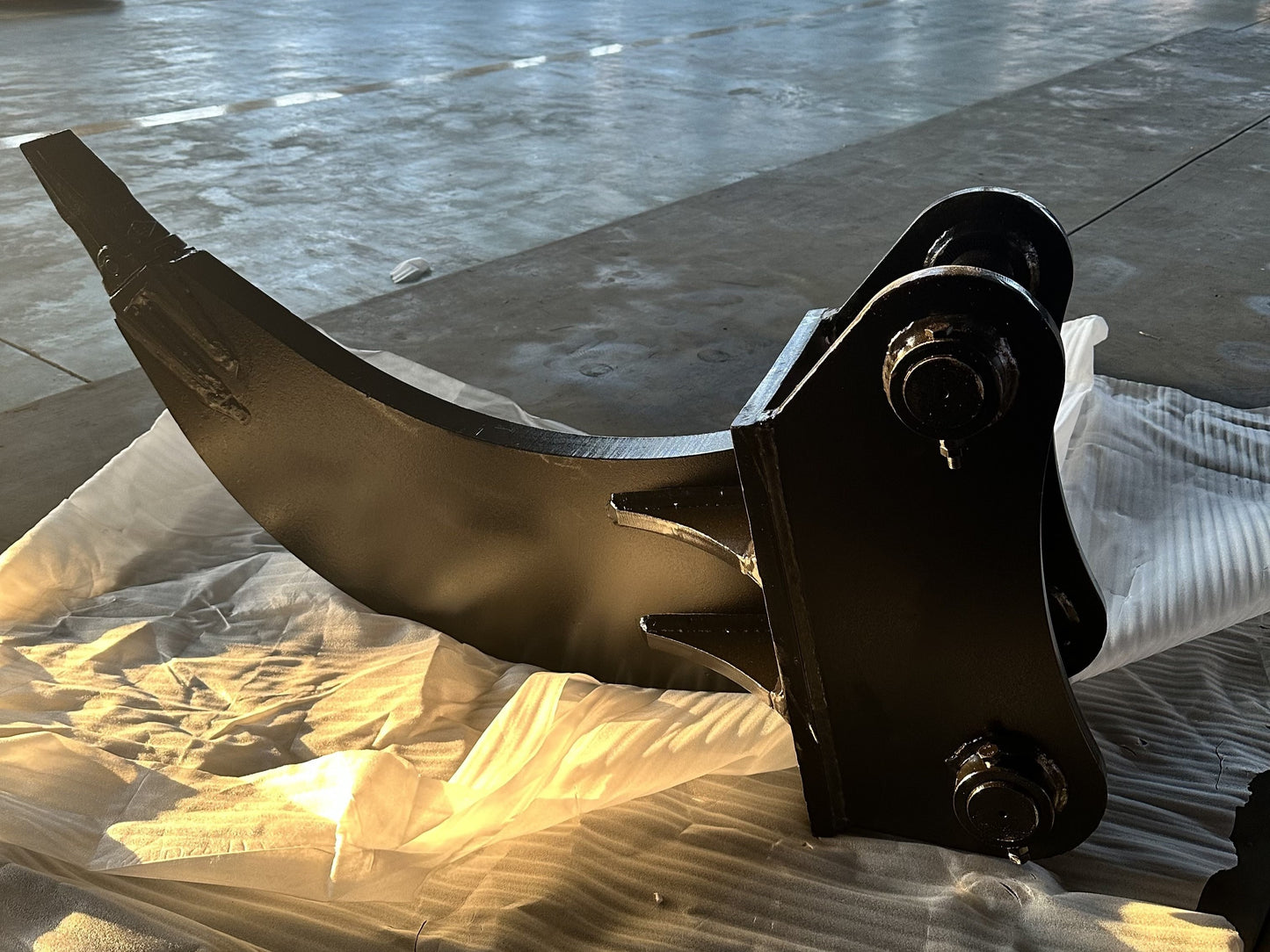 Heavy duty excavator ripper attachment with reinforced design for breaking rock, permafrost, and compact soil