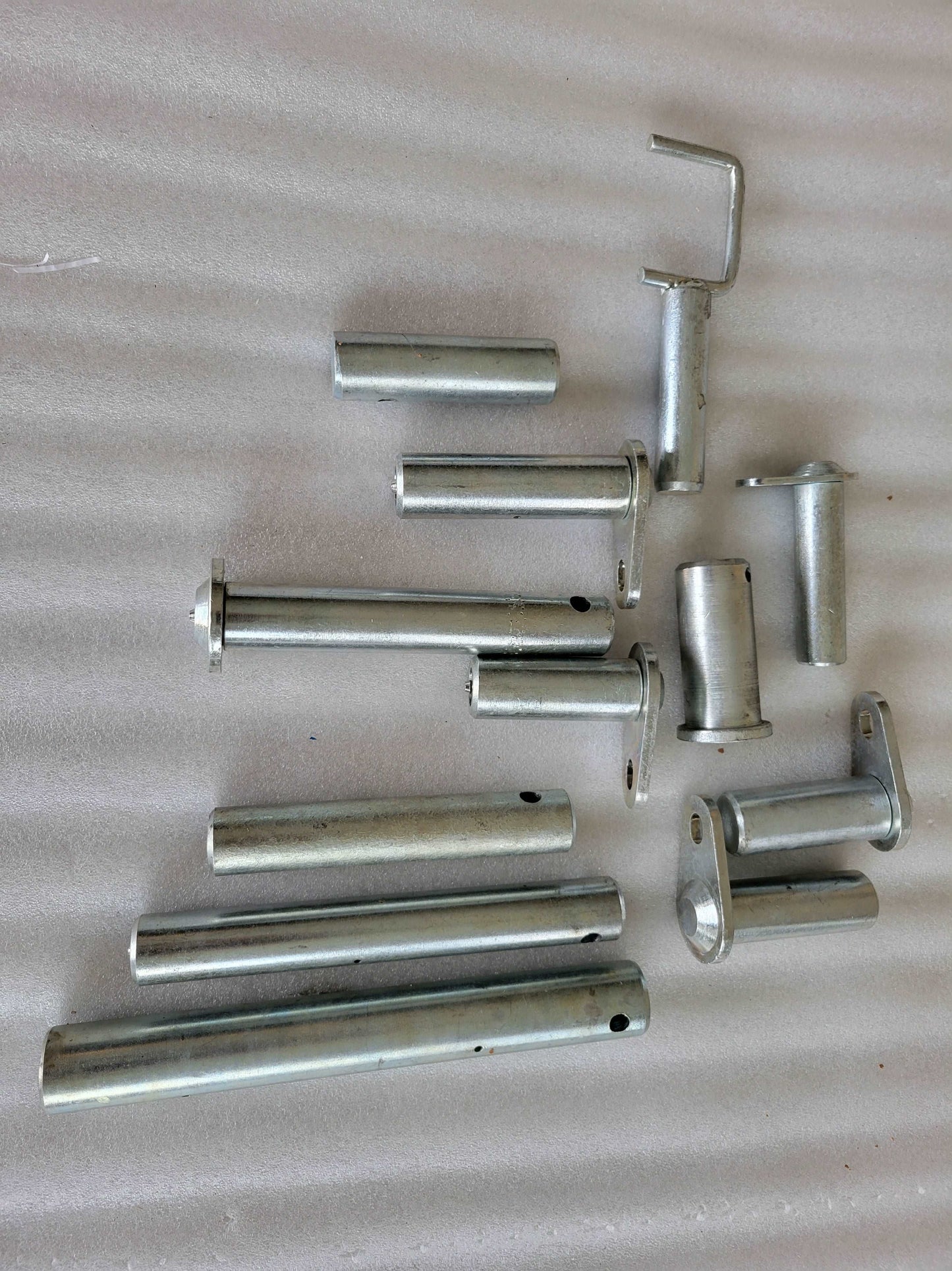 OEM excavator bucket and linkage pins by JoyT5 – durable steel replacement parts for excavators, skid steers, and wheel loaders. High-quality heavy equipment components available in Calgary, Canada.