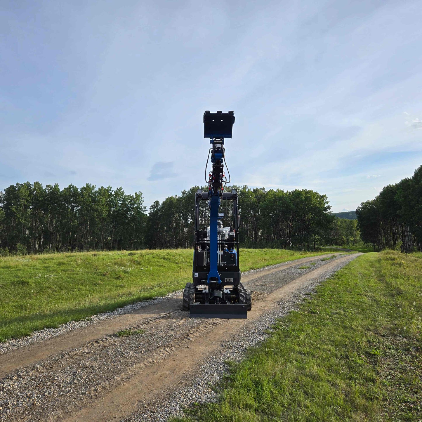 JoyT5 Rippa R18 Mini Excavator front view with bucket raised to maximum height