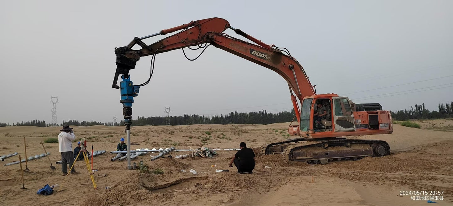 JT5 40000 anchor drive for sale in Canada high torque hydraulic helical pile drive operating on sandy ground during foundation and ground anchor installation