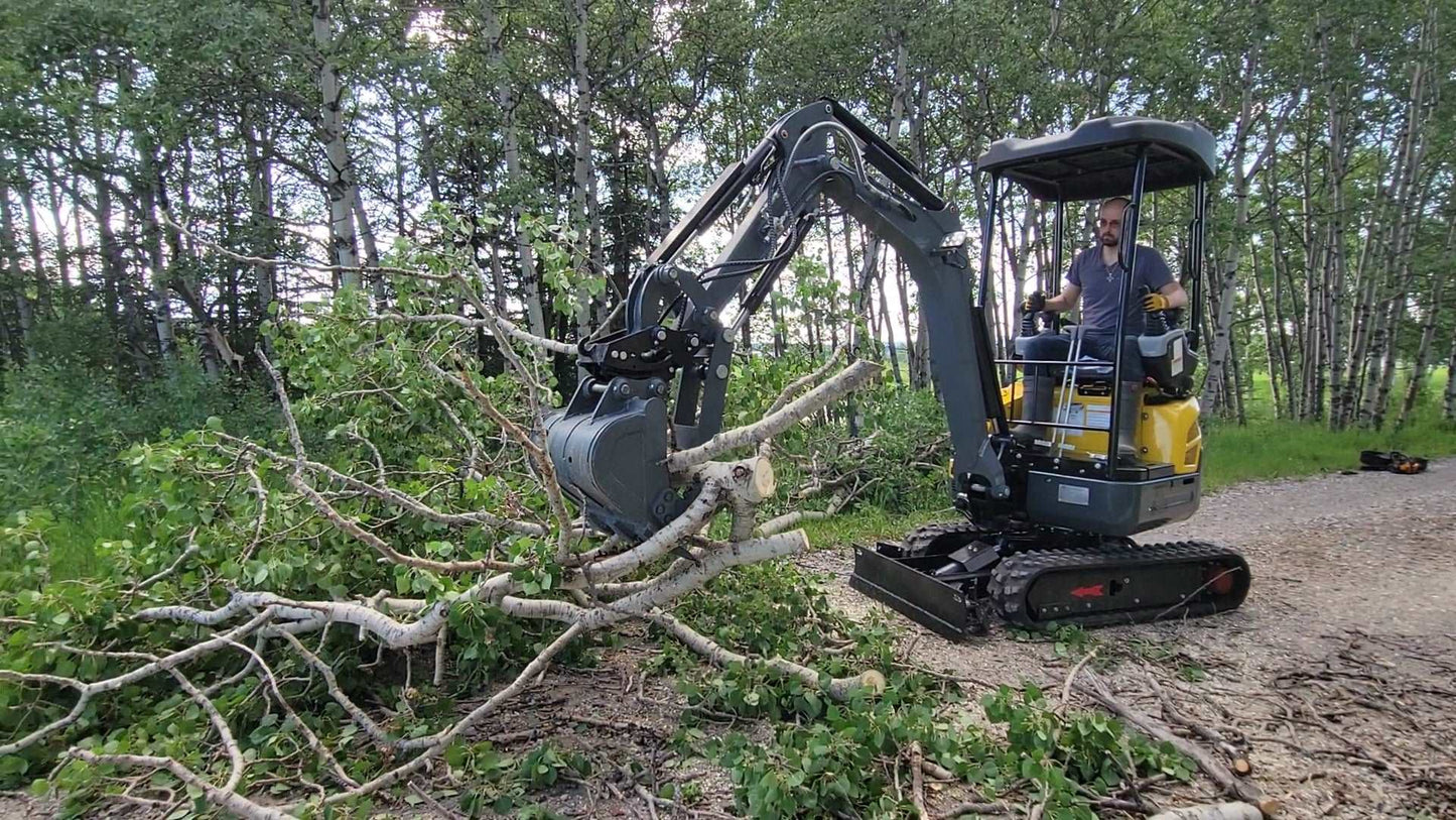 JoyT5 JT5200 2 ton mini excavator with Kubota D902 engine using hydraulic thumb for tree clearing. Compact zero-tail excavator with U-boom and side swing boom for landscaping and utility work.