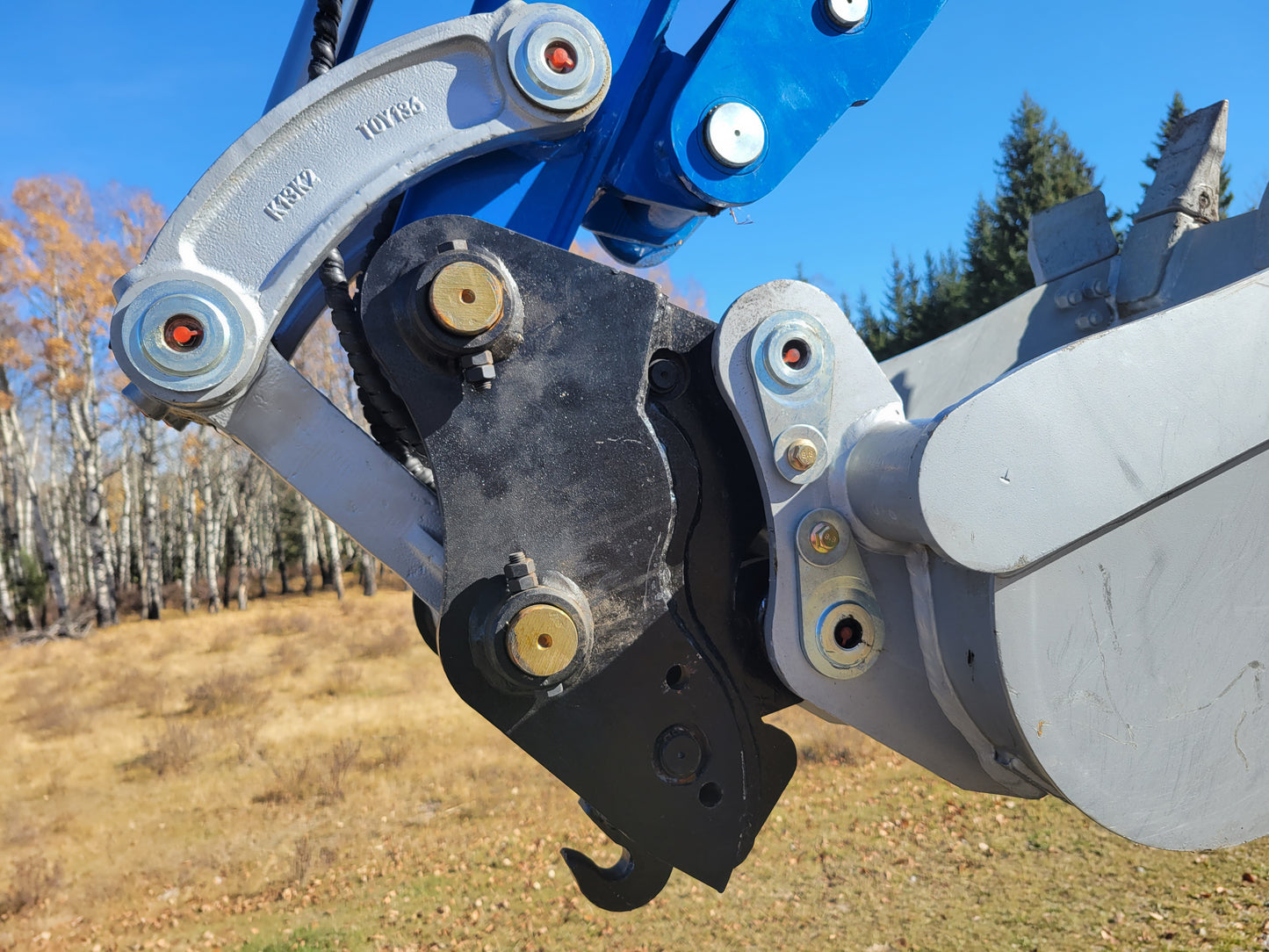 JT5350 3.5 ton mini excavator hydraulic coupler attachment close view showing durable connection system powered by Kubota engine for construction use in Canada