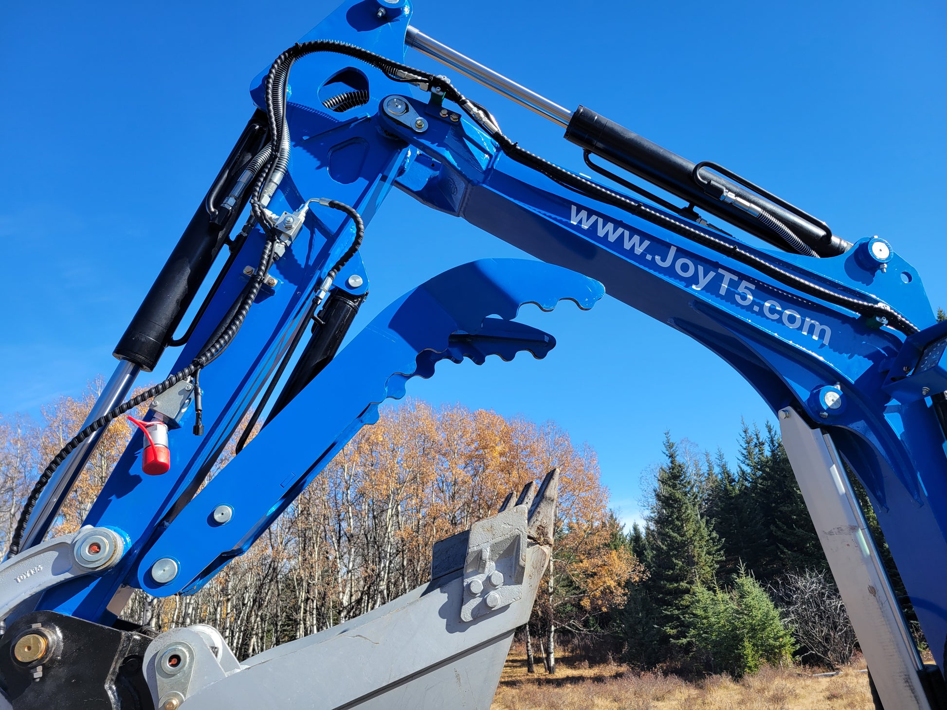JT5350 3.5 ton mini excavator hydraulic thumb attachment close view showing Kubota engine powered compact excavator arm used for digging and lifting in Canada