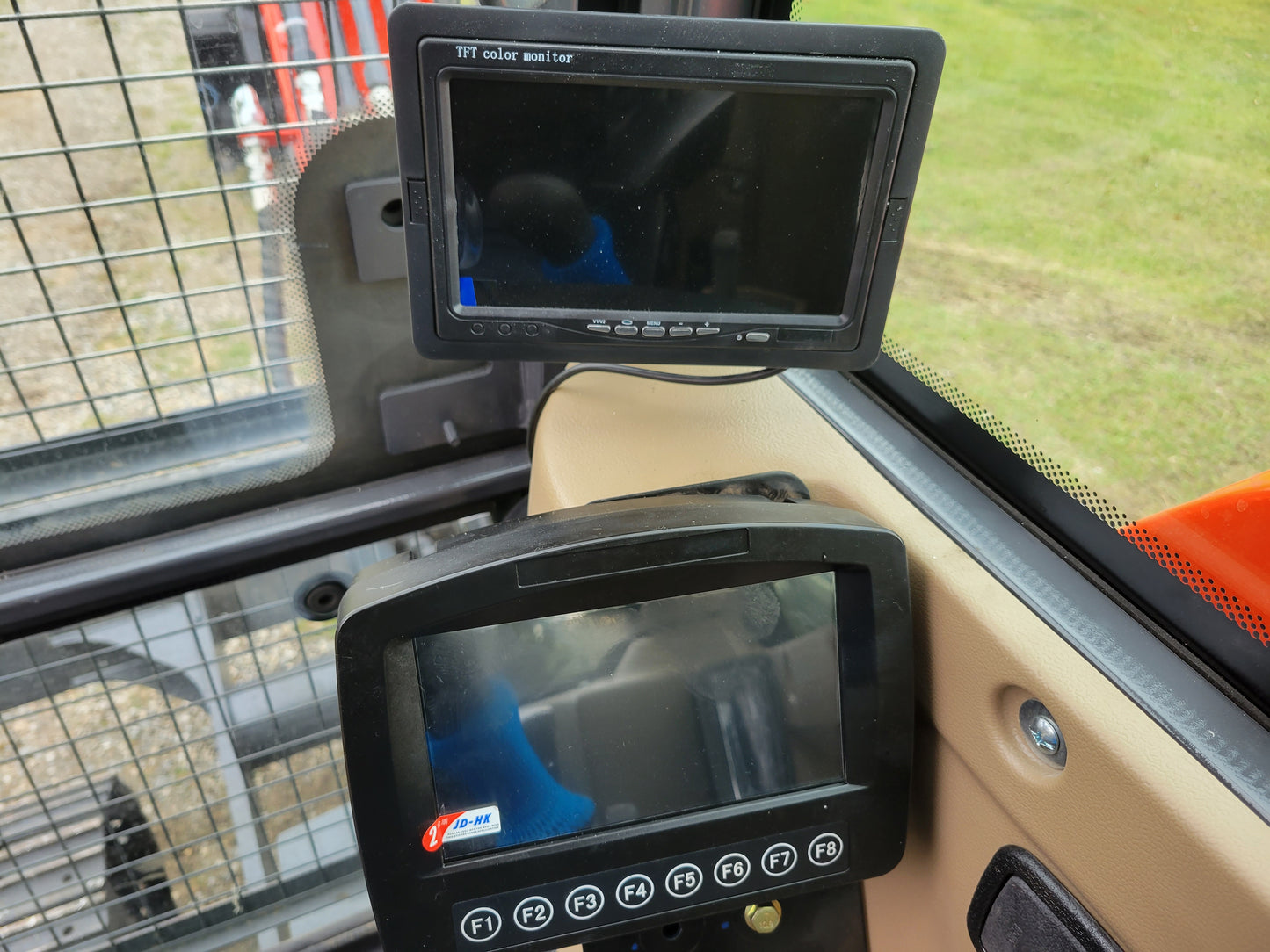 JT5600 6 ton mini excavator for sale in Canada powered by Yanmar engine digital control panel and monitor display modern compact construction equipment interior view