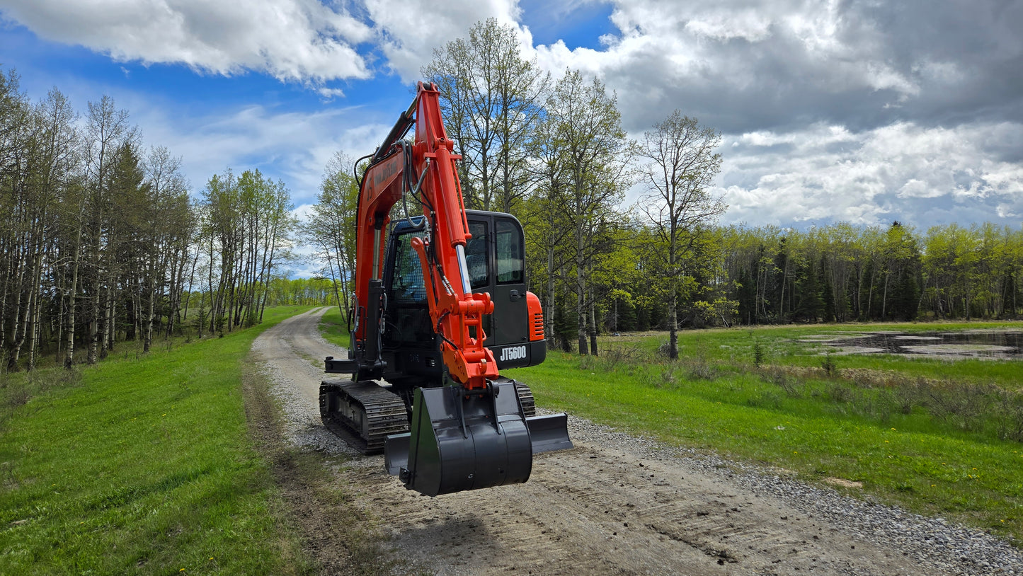 JT5600 6 ton mini excavator for sale in Canada powered by Yanmar engine small construction equipment working on rural gravel road compact excavator for landscaping and building projects
