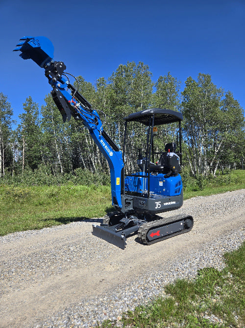 Mini excavator for sale Rippa R15 digging arm raised on gravel road with trees