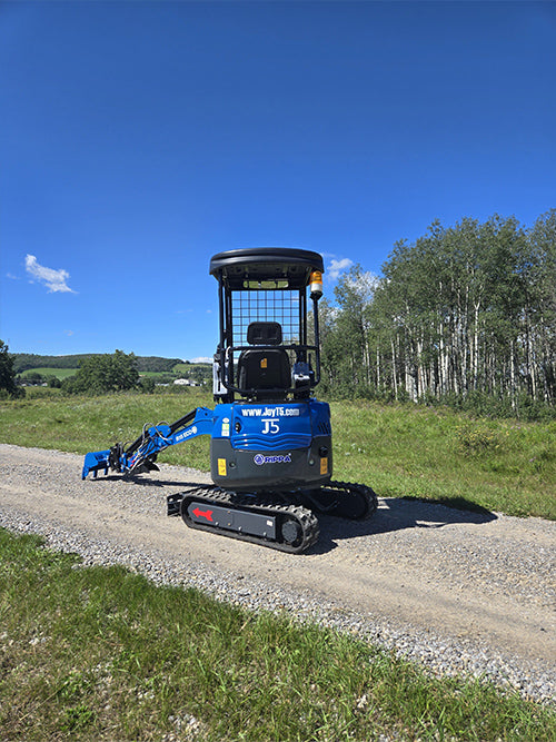 Mini excavator for sale Rippa R15 front view on gravel road in countryside