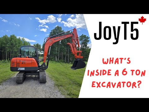 Inside view demo of JT5600 6 Ton Mini Excavator with Yanmar engine showing internal features and compact design for construction projects in Canada