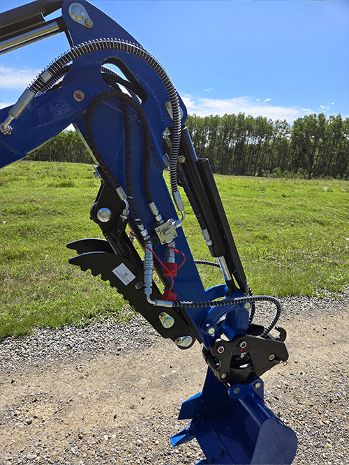 Close-up of rippa r15 mini excavator for sale hydraulic arm with grapple attachment and hoses
