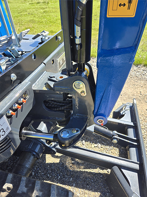 Closeup of Rippa R15 mini excavator for sale hydraulic joint and control linkage system
