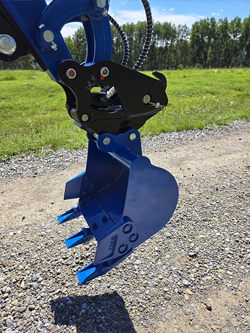 Closeup of Rippa R15 mini excavator digging bucket with teeth attachment