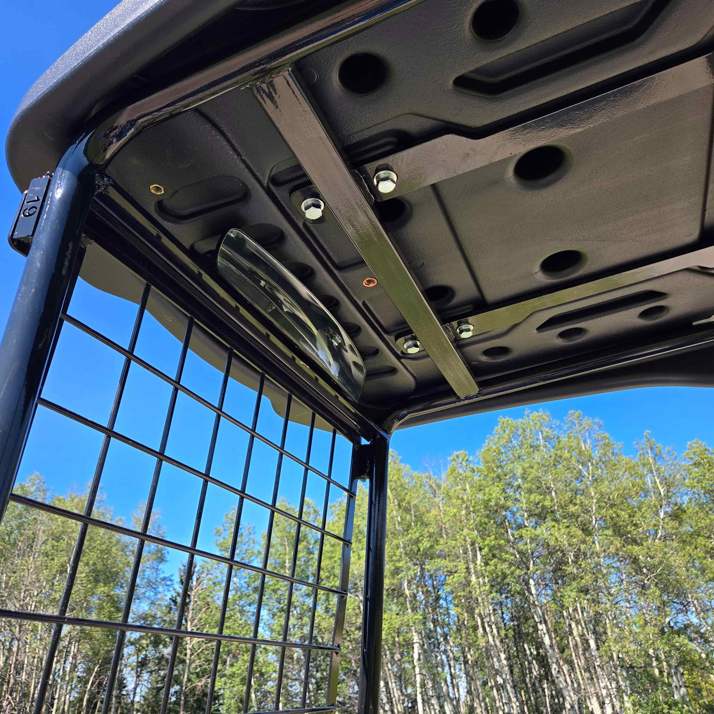 Protective ROPS cabin roof and safety guard design of the Rippa R15 Mini Excavator for operator protection.