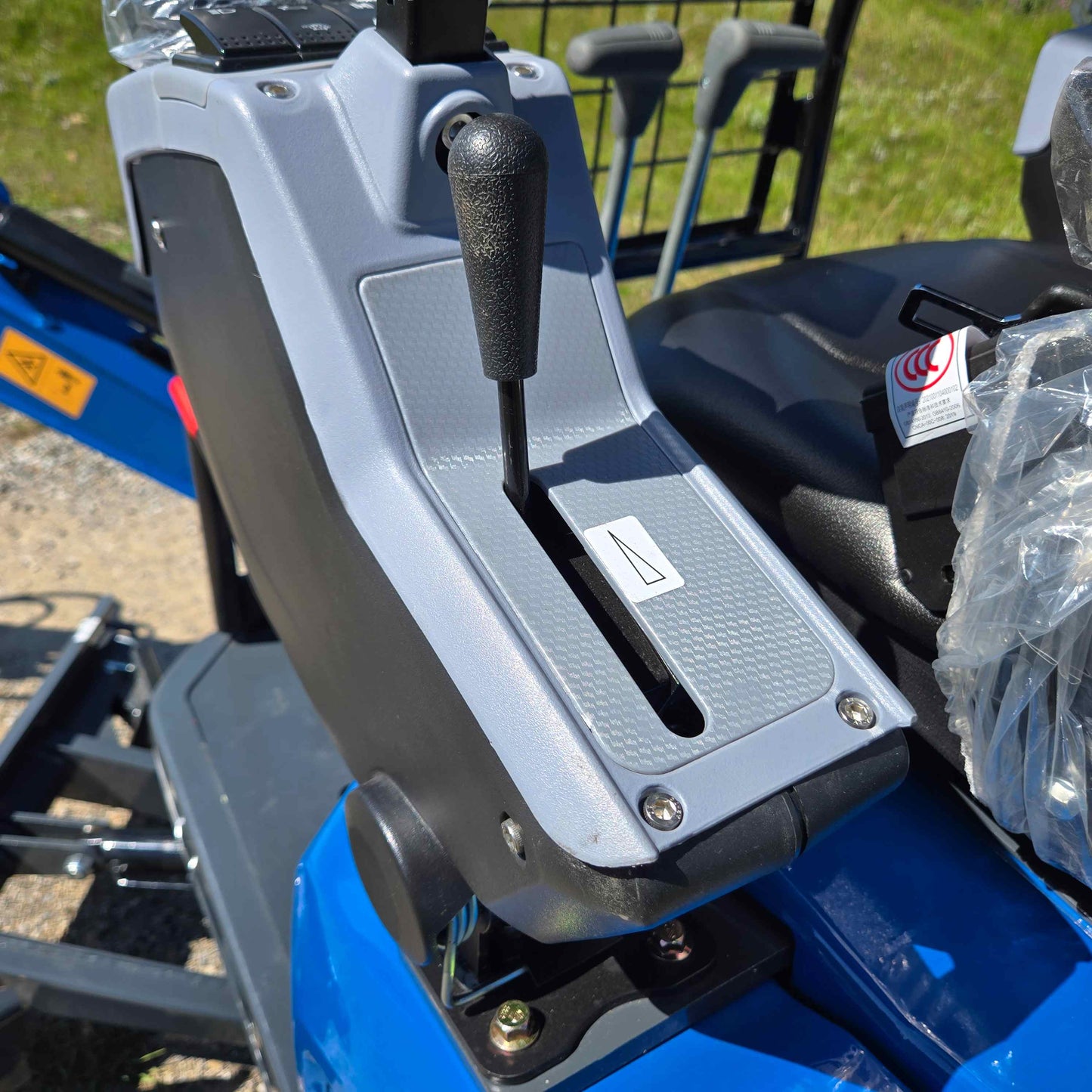 Close-up view of the Rippa R15 Mini Excavator hand control lever for precise operation.