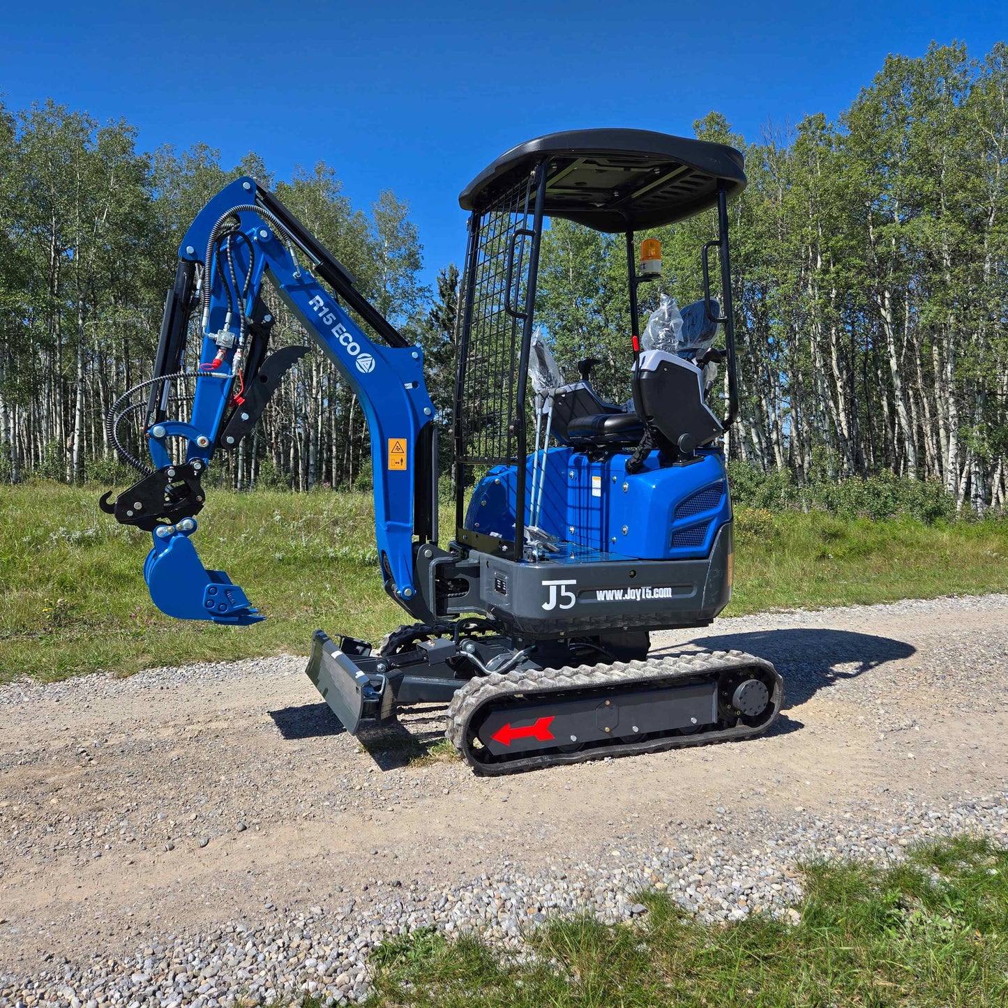 Rippa R15 mini excavator for sale side view with protective cabin