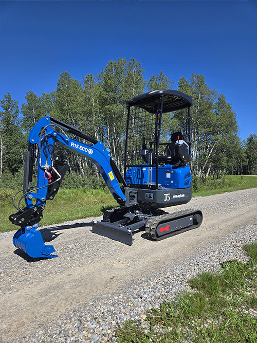 Rippa R15 mini excavator for sale with digging bucket on gravel road