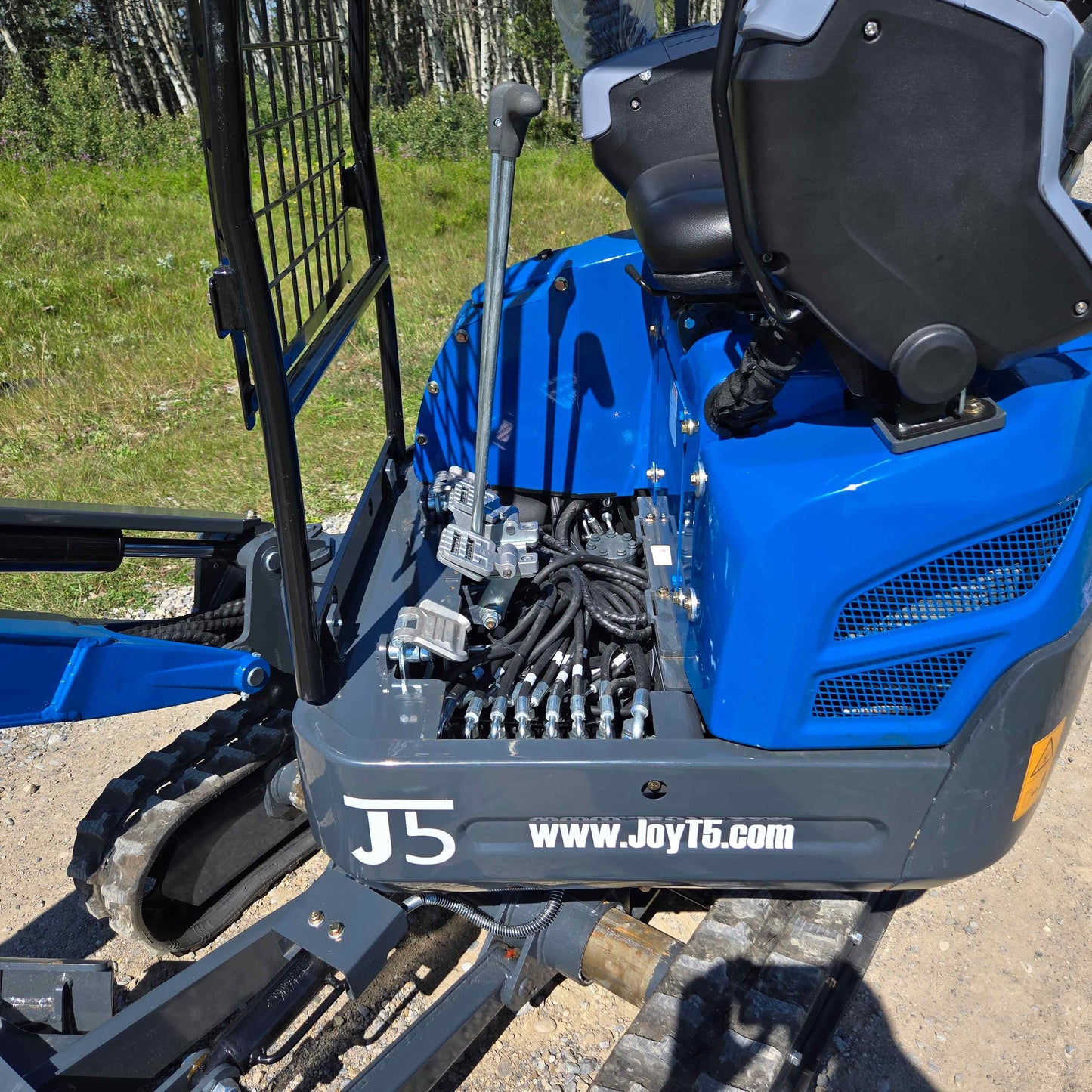Detailed hydraulic system and control levers of the Rippa R15 Mini Excavator for precision operation.