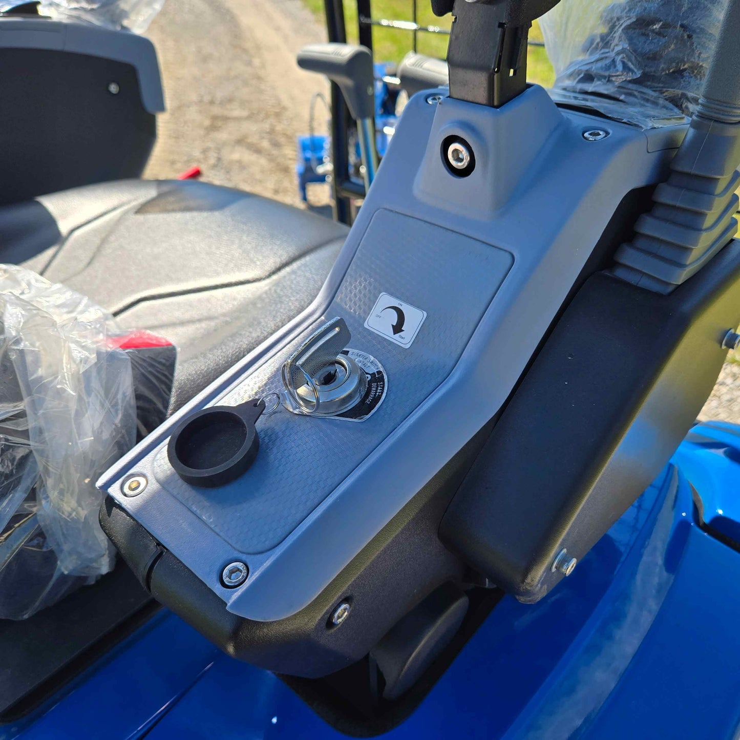 Ignition key and control panel of the Rippa R15 Mini Excavator for easy start and operation.