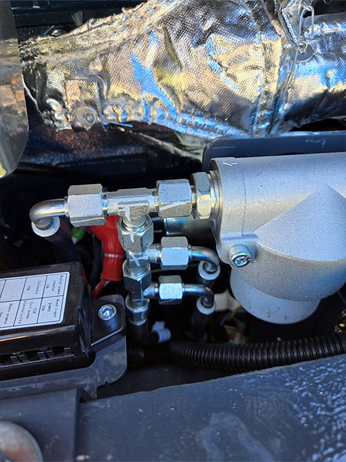 Close-up view of Rippa R15 mini excavator for sale hydraulic hose connections and fittings for oil pressure system