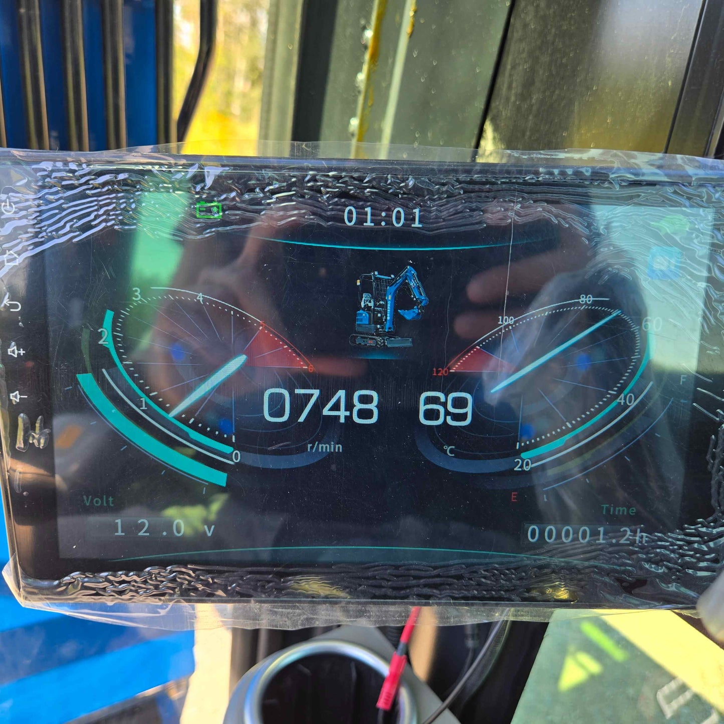 Digital dashboard of the Rippa R22 Mini Excavator for sale displaying 748 rpm, 69°C engine temperature, 12.0V battery voltage, and fuel level indicators.