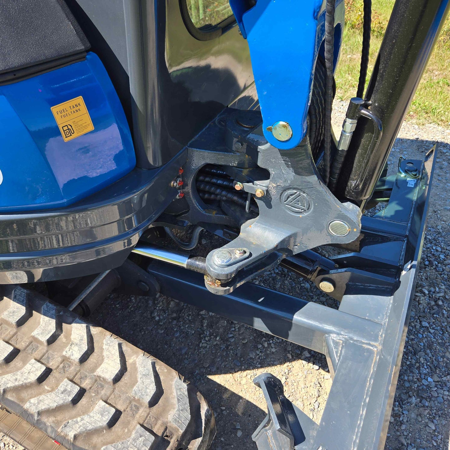 Close-up of Rippa R22 Mini Excavator for sale hydraulic system with track and stabilizer frame.