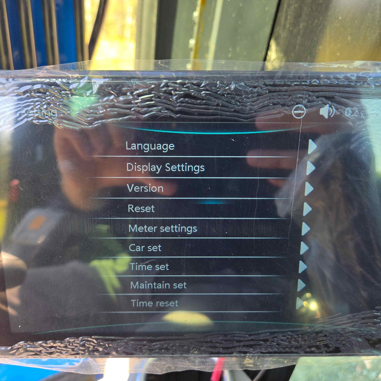 Settings screen of the Rippa R22 Mini Excavator for sale showing options such as Language, Display Settings, Version, Reset, Meter Settings, Car Set, Time Set, Maintain Set, and Time Reset.