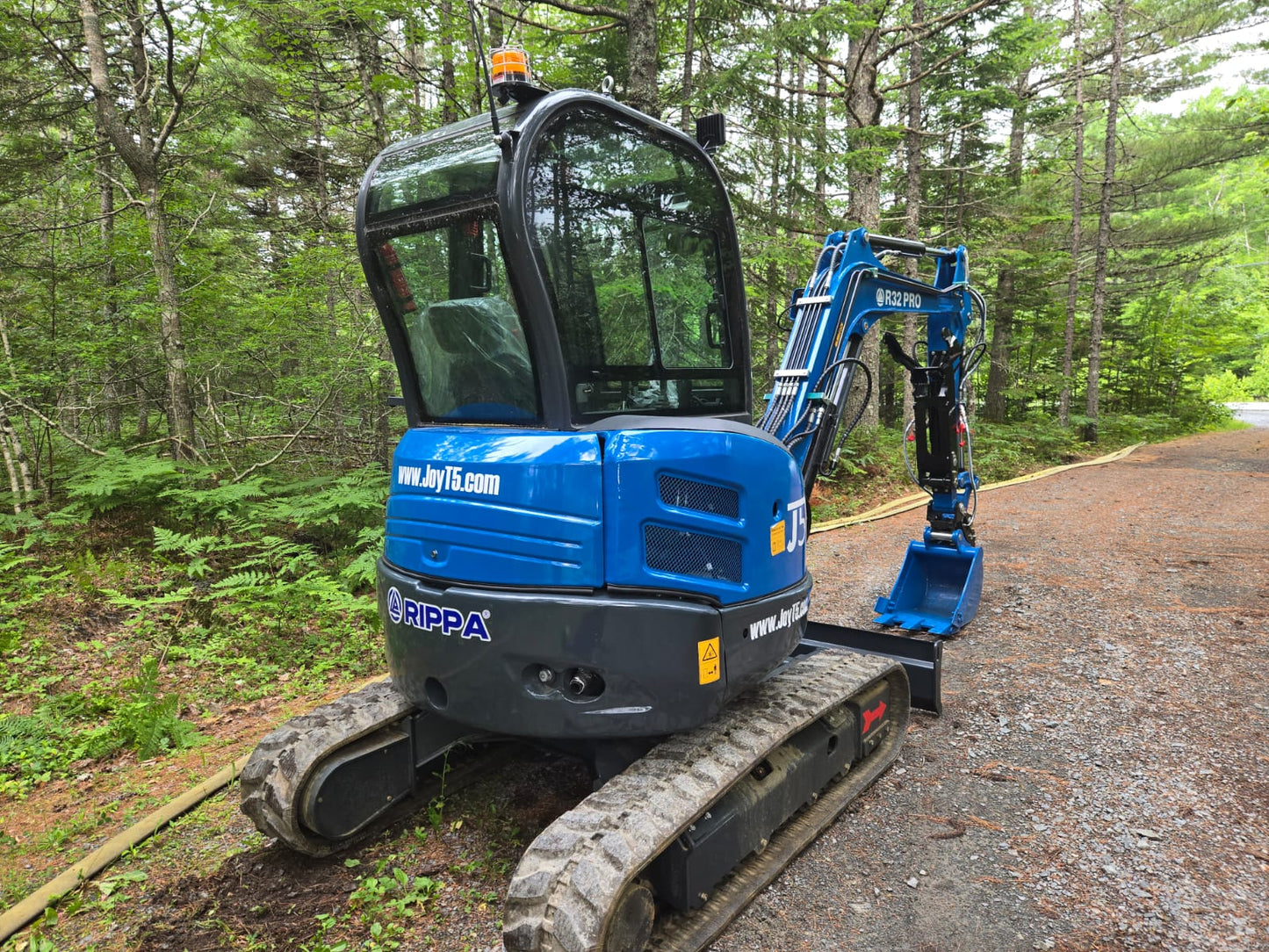 Rippa R32 Mini Excavator in Canada with trenching bucket, compact excavator for construction and landscaping | JoyT5