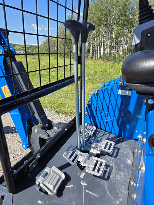 Rippa R15 mini excavator for sale operator cabin showing control pedals and hand levers for machine operation