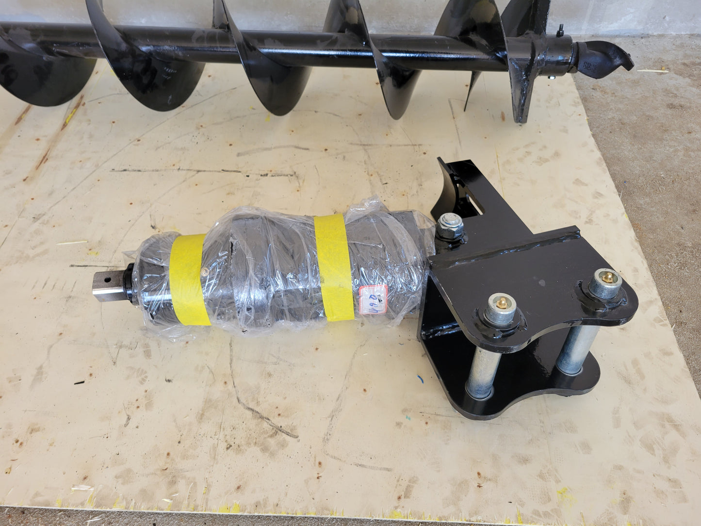 JoyT5 excavator auger drive attachment with hydraulic motor and heavy-duty mount.