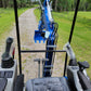 operator cabin view of 1.2 ton mini 
excavator with joystick controls and 
boom arm on gravel path for rent in 
Calgary Alberta
