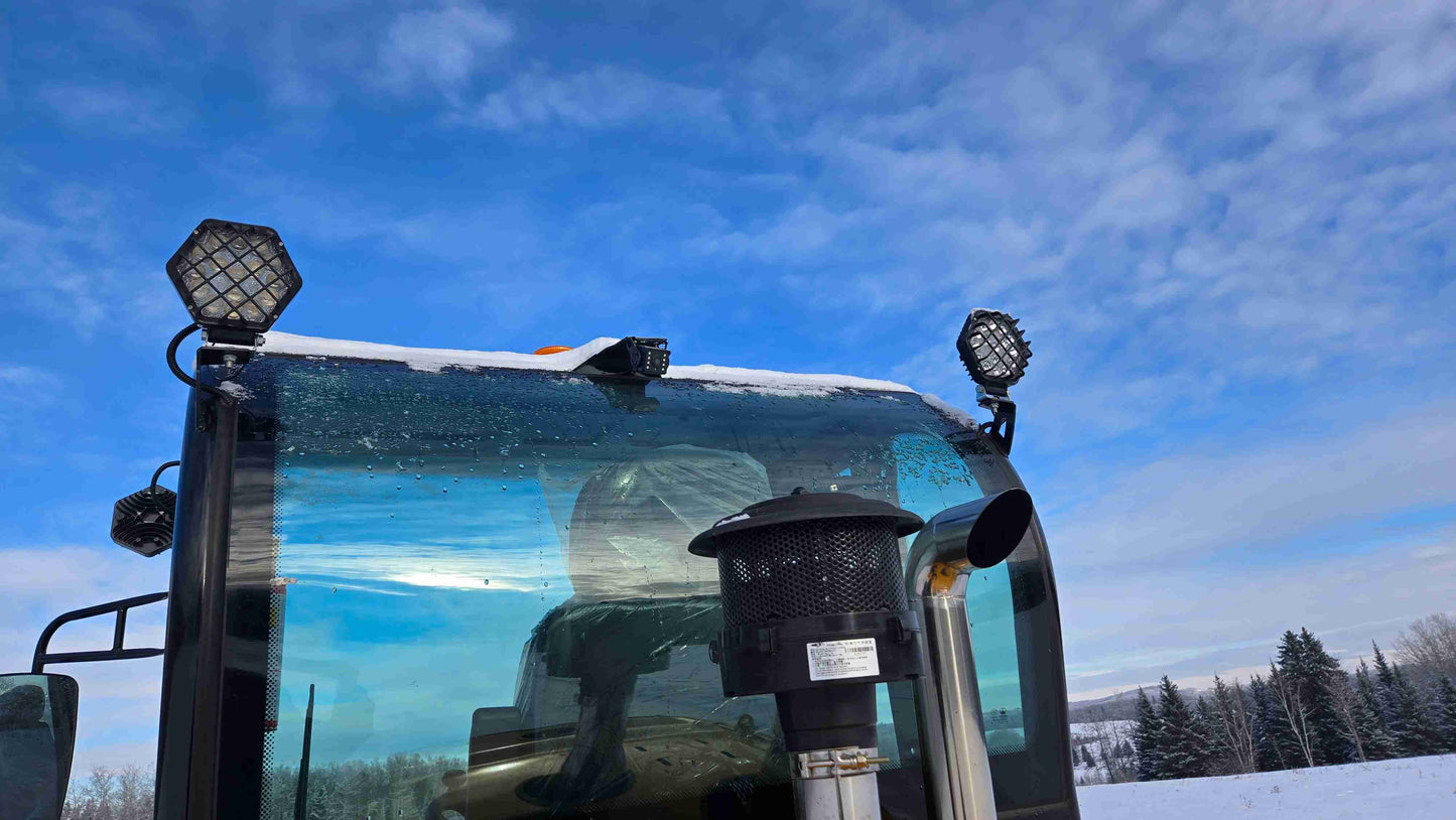 top section of 1.5 ton compact wheel loader showing work lights exhaust and safety warning system in Canada

