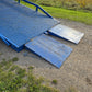 Twelve ton mobile loading ramp close view showing blue steel ramp plates and grip surface for forklift and truck container loading in Canada