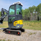 2 ton full cab compact excavator parked outdoors on gravel in Calgary Alberta available for rent for landscaping and excavation projects