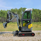 2 ton full cab mini excavator side view standing on gravel surface in Calgary Alberta available for hire for construction and landscaping use

