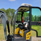 Interior cabin view of JoyT5 JT5200 2 ton mini excavator for rent in Calgary, Alberta full cab compact excavator showing operator seat and controls for landscaping and construction projects in Canada.

