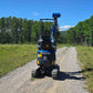 Rippa R13 mini excavator for sale by JoyT5 on a dirt path with trees and grass in the background