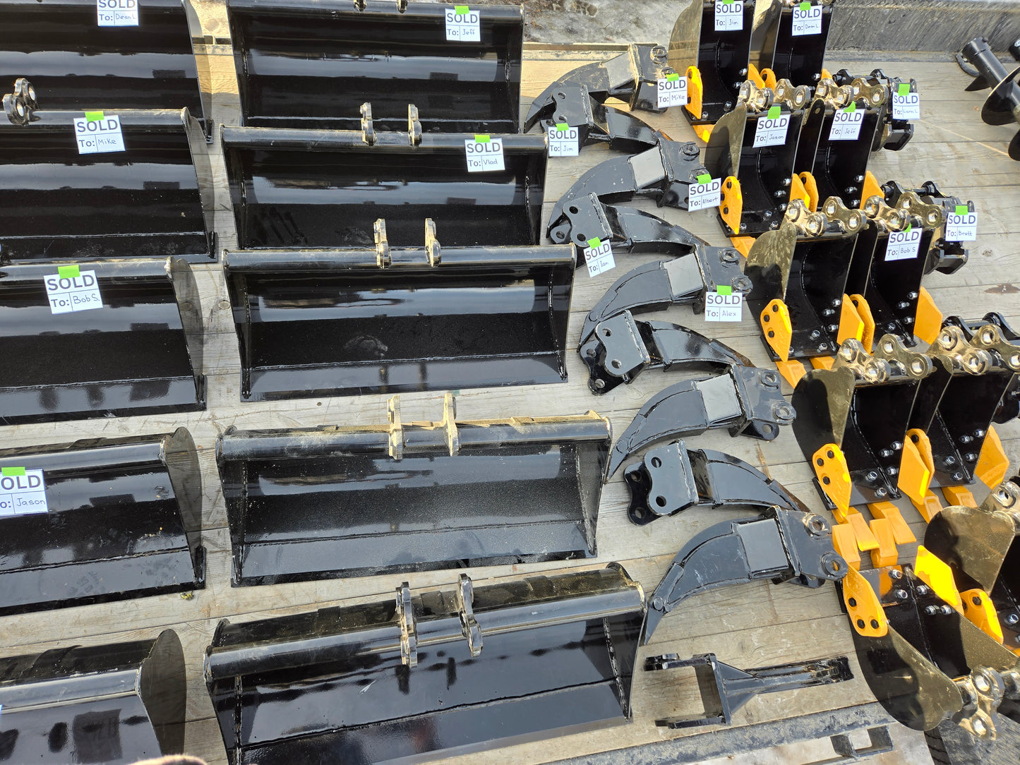 Agrotk and FF Industrial mini excavator attachments with 90x92x25mm mount pattern including buckets rippers and quick hitches for construction and landscaping in Canada

