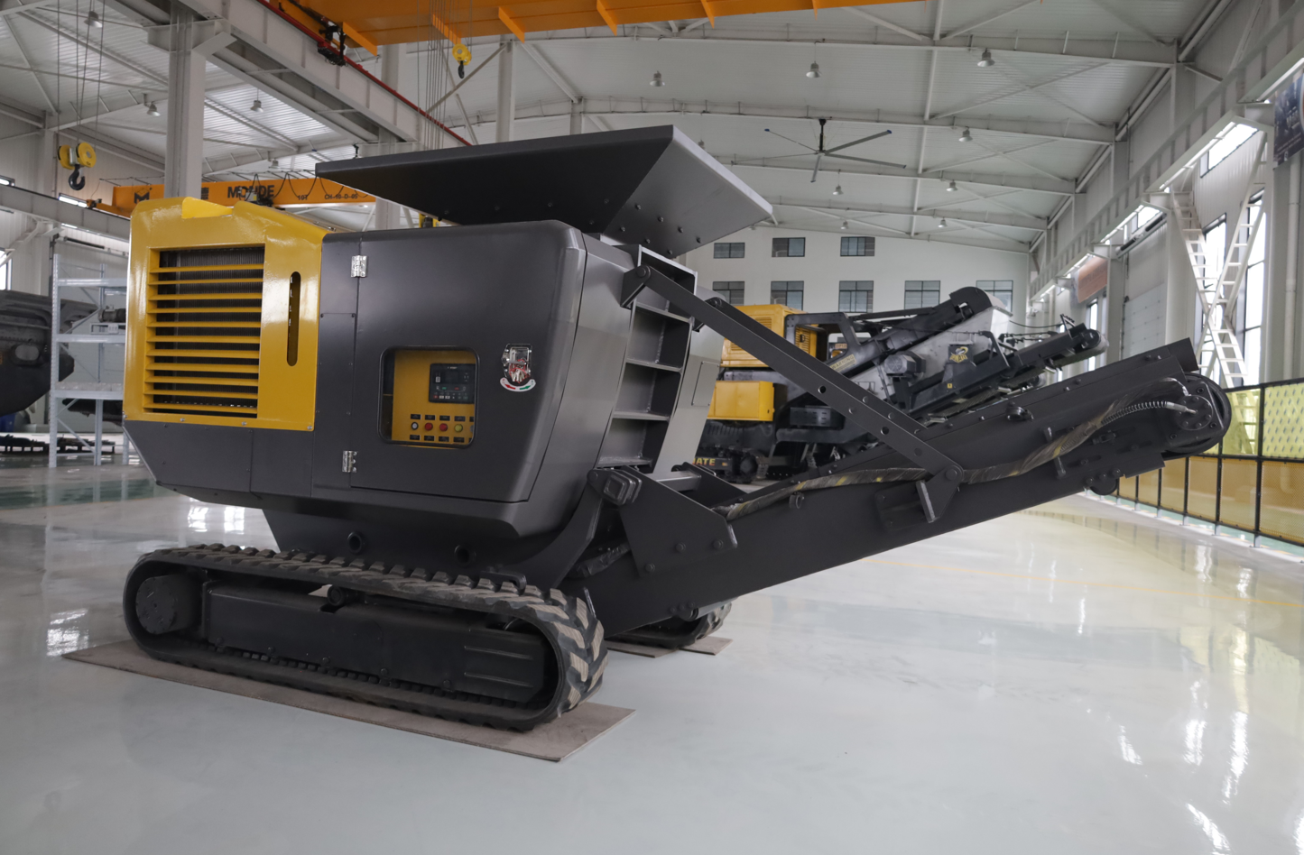 compact mini mobile crusher in Canada showing tracked crusher for construction site demolition recycling and on site waste crushing applications