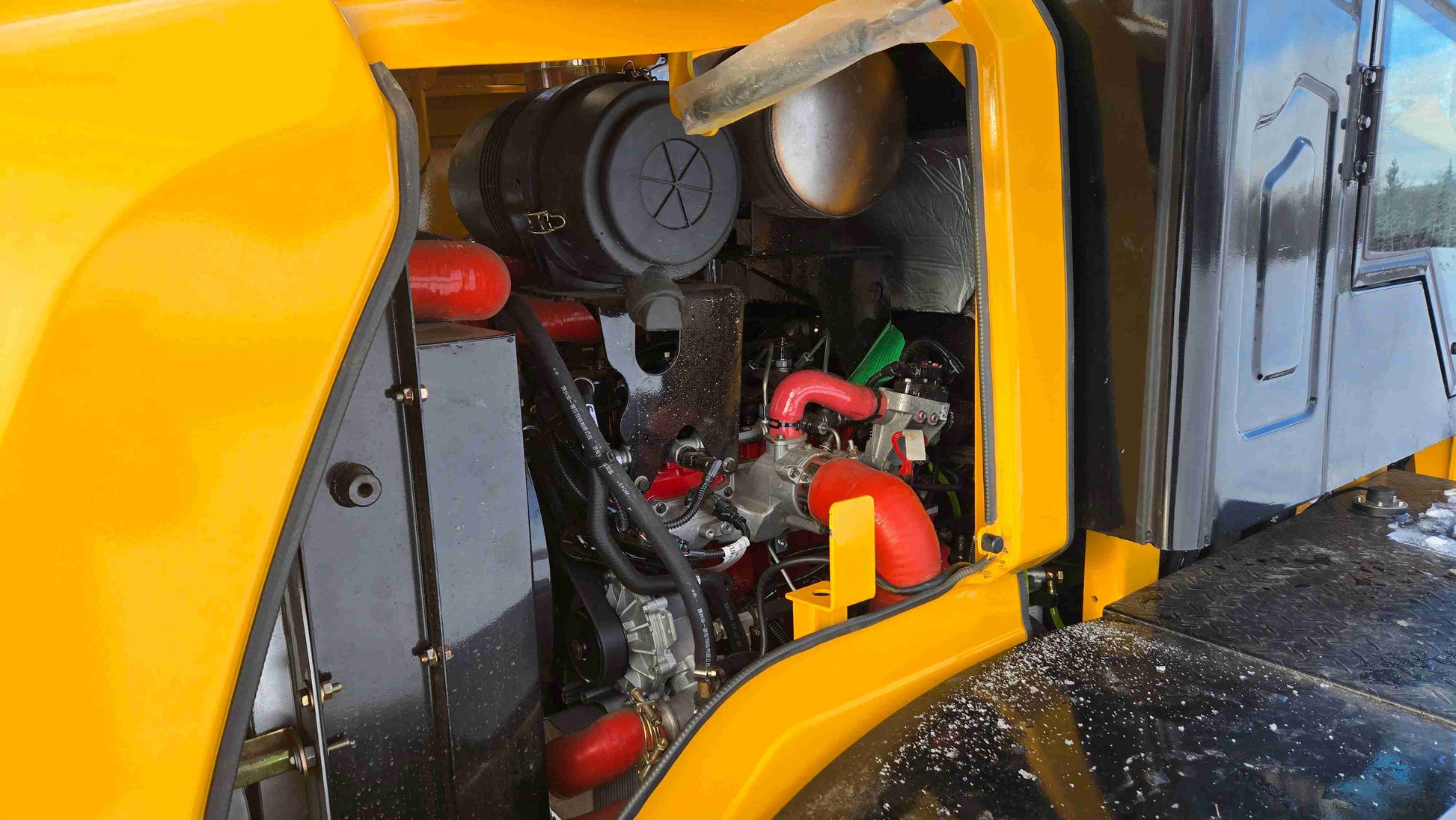 Compact Wheel Loader JT5WL1500 1.5 Ton for Sale in Canada open engine compartment showing diesel engine power system and airflow design for snow removal and construction tasks