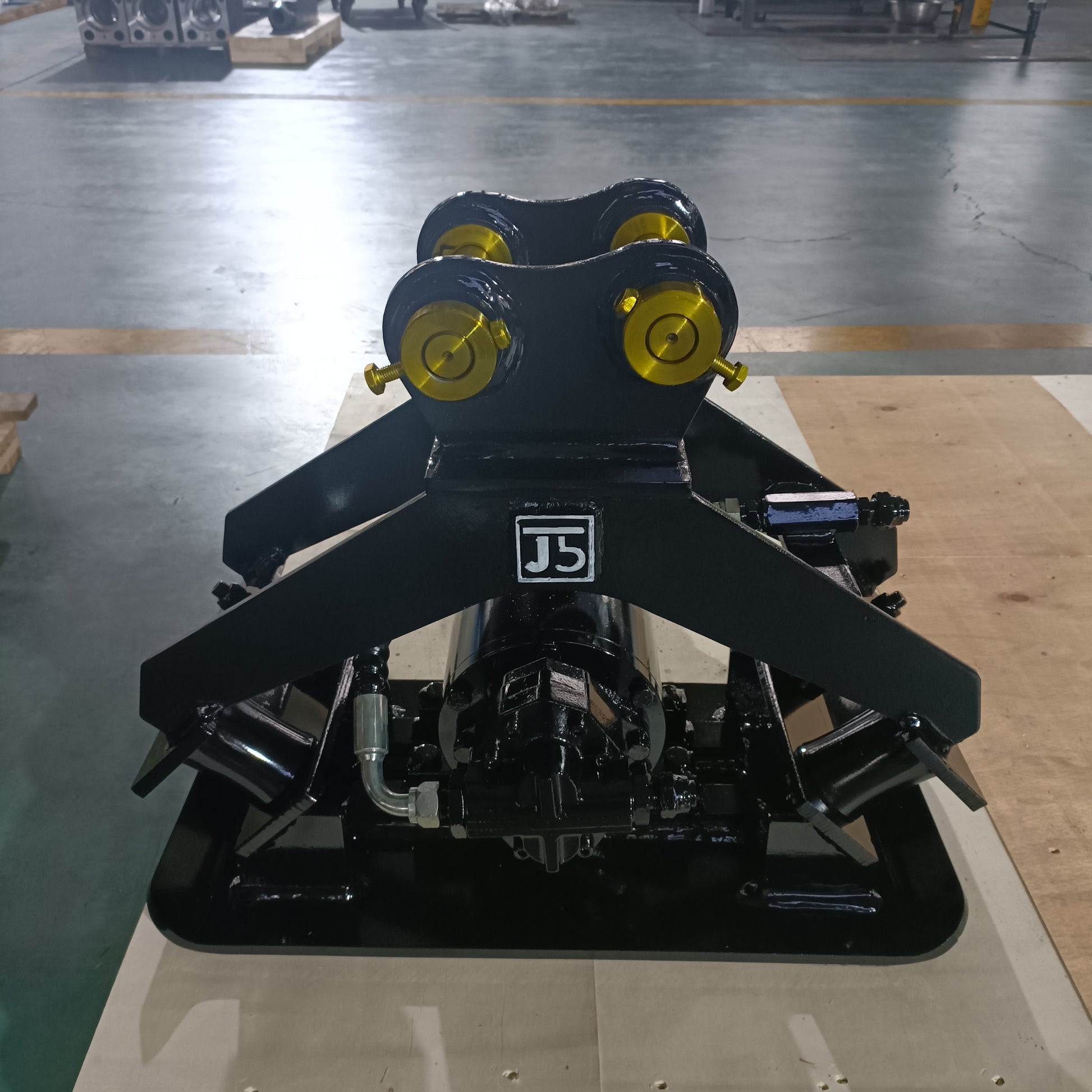 custom excavator hydraulic compactor attachment made in Canada heavy duty equipment used for soil compaction and construction work

