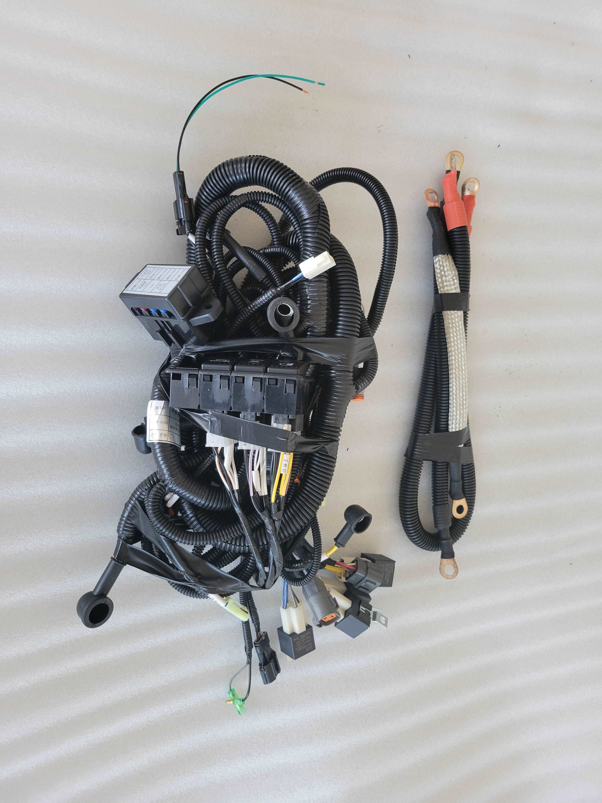 Electrical wiring harness set for excavator and loader parts designed for heavy equipment repair and replacement in Canada