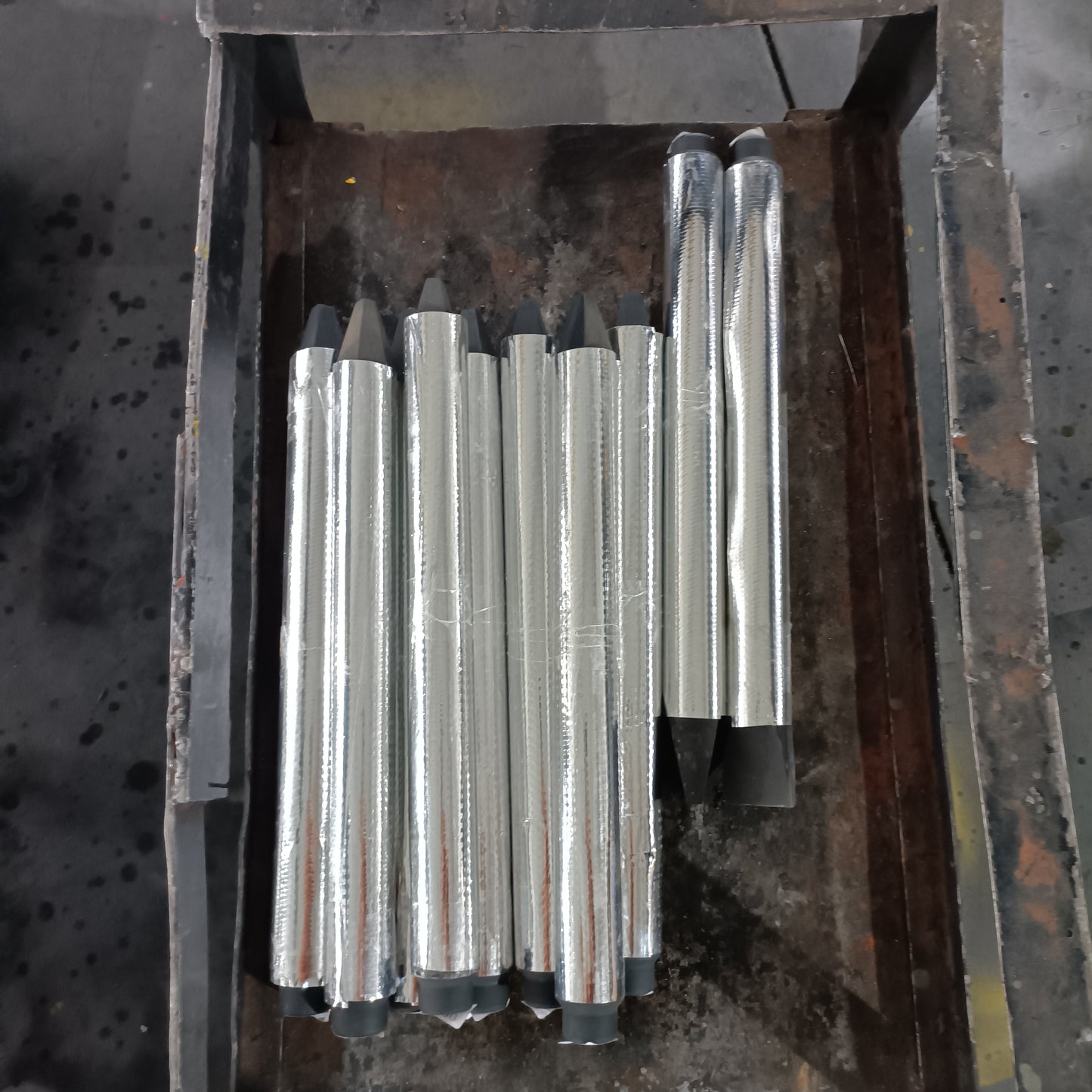 High quality steel pins for custom excavator attachments made in Canada used in heavy duty construction and hydraulic systems