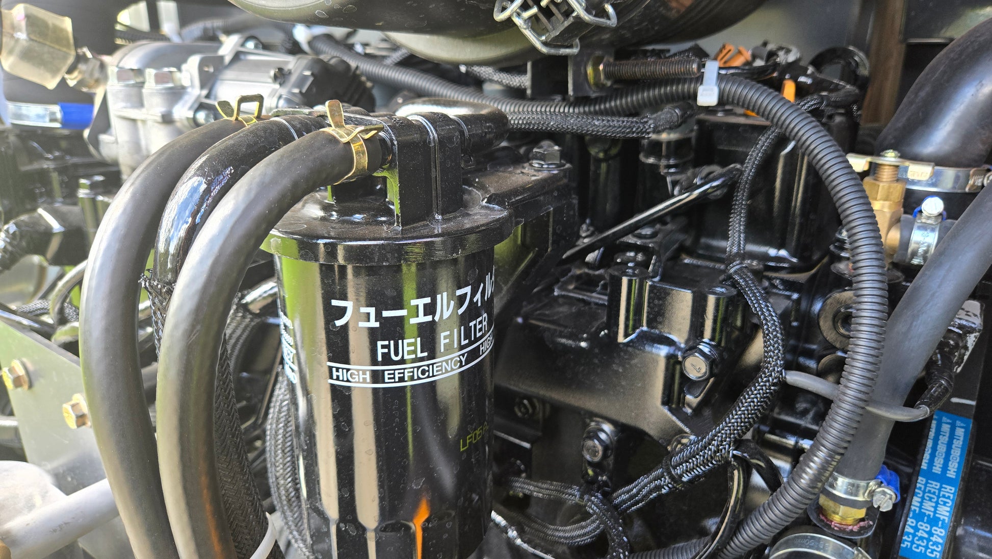 Fuel filter system of Yanmar diesel engine on JT5600 6 ton mini excavator for sale in Canada, compact excavator with efficient engine parts for construction projects

