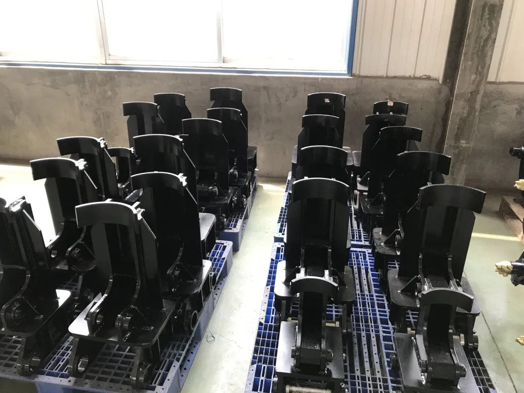Hydraulic auger for excavators Canada and USA showing heavy-duty cradle mounting brackets for excavator auger attachment used in construction and foundation drilling.

