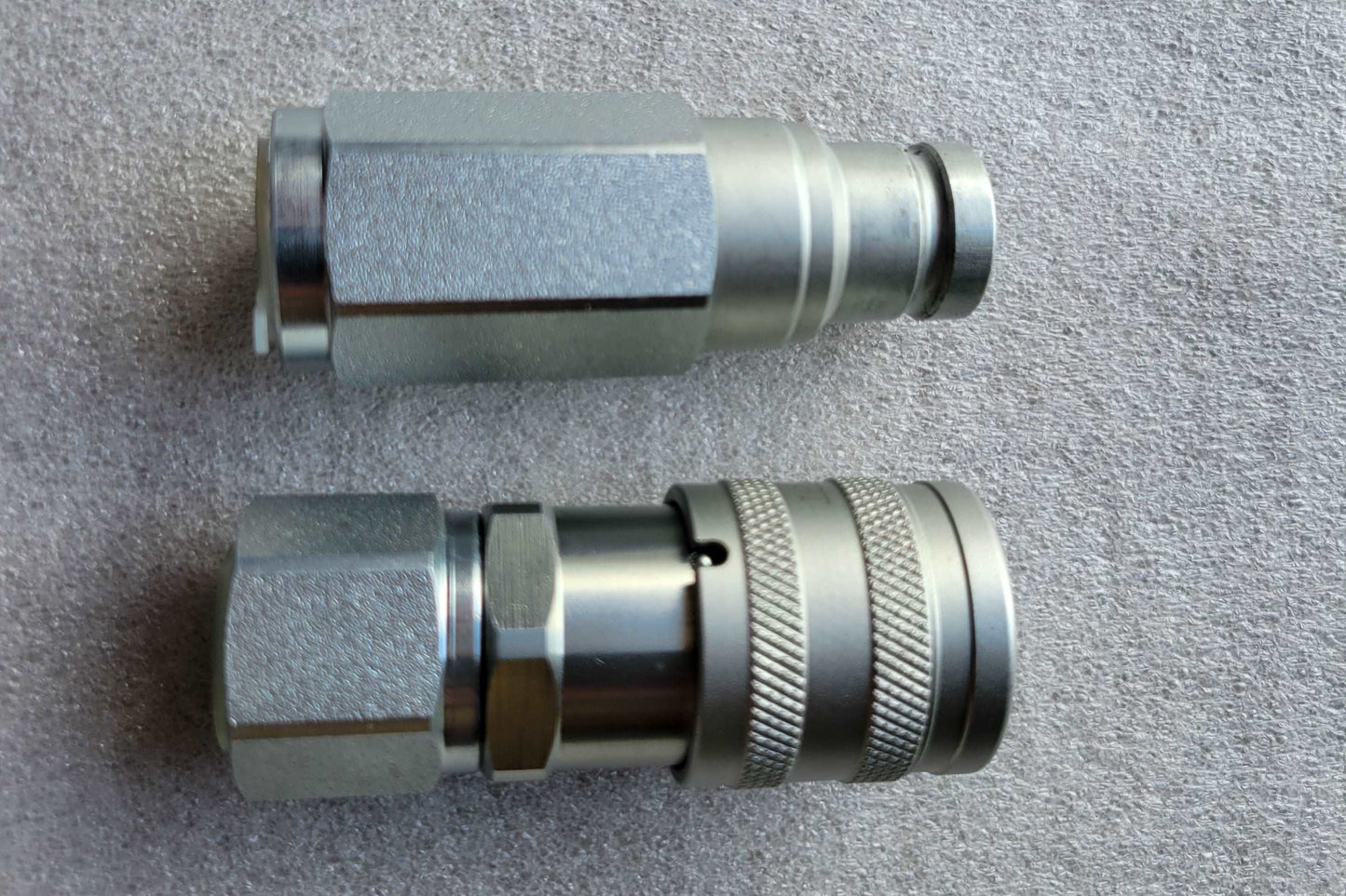 Stainless steel hydraulic flat face quick coupler 3/8 NPT male and female set for excavators, skid steers, and loaders. Leak-free ISO16028 compatible hydraulic quick connect fittings, Parker, Safeway, and Stucchi interchangeable, available in Canada.