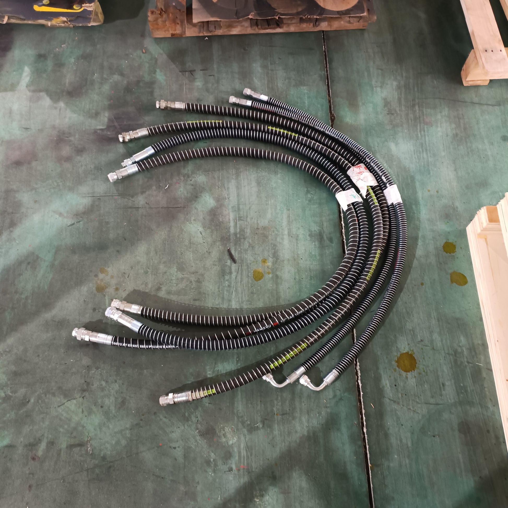 Durable hydraulic hoses for custom excavator attachments made in Canada used in heavy duty hydraulic systems for construction equipment


