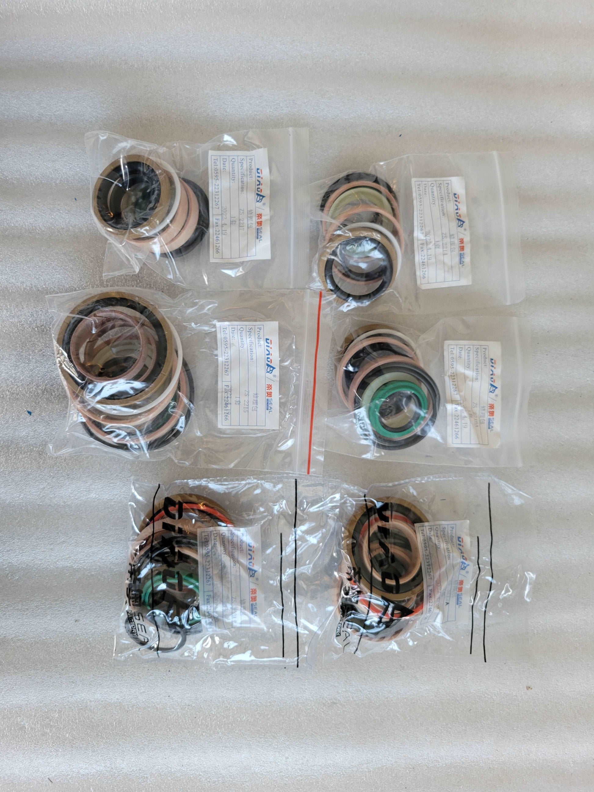 Hydraulic seal kits for excavator and loader maintenance used in construction machinery and heavy equipment parts across Canada

